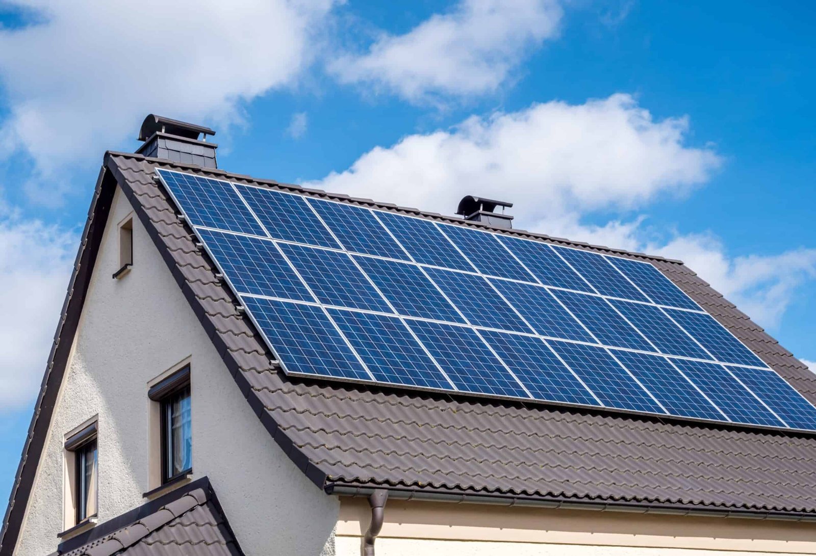 How Residential Solar Panels Work: A Complete Guide for Beginners white-home-scallop-roof-and-solar-panels-shutterstock-1336991930-scaled-1-scaled